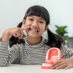 A smiling young dental patient